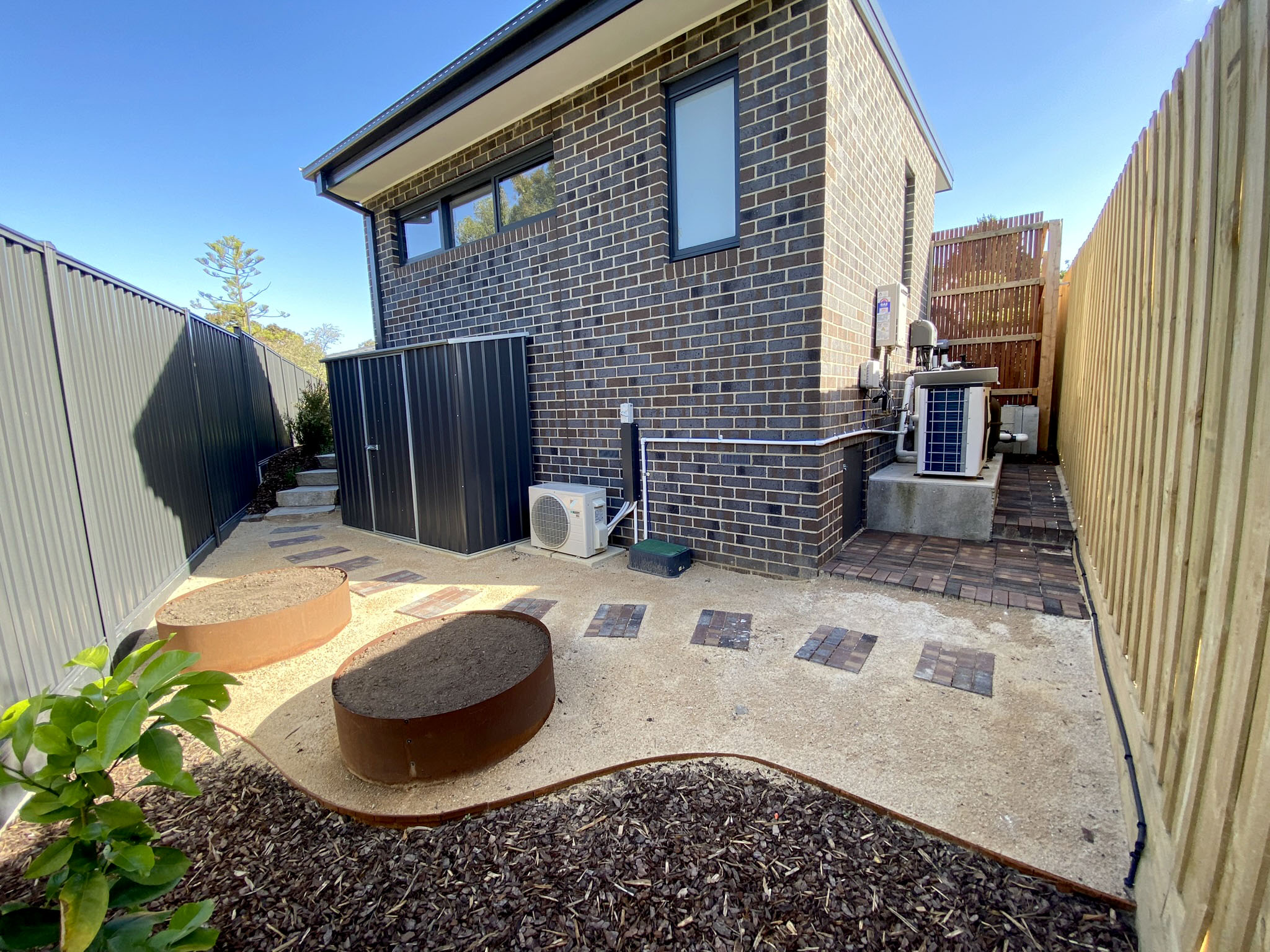 Corten edging and fire pit area
